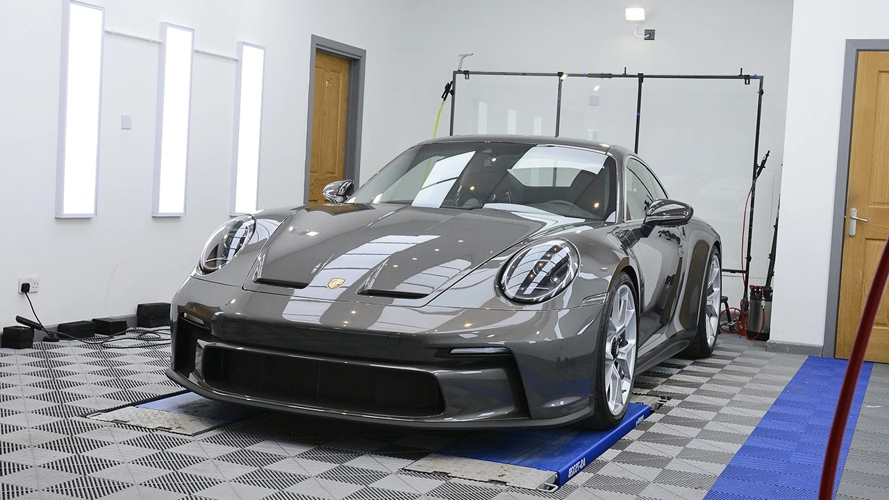 Silver Porsche after paint protection film installation in Toronto